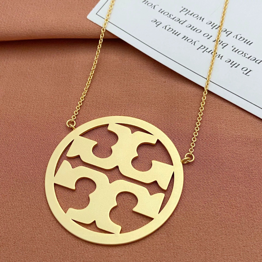 Tory Burch Inlaid Hollow Letter Round Pendant Metal Necklace
